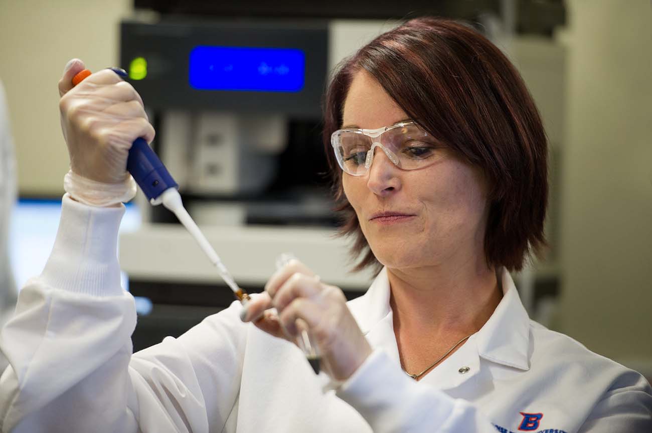Image of woman working a in lab