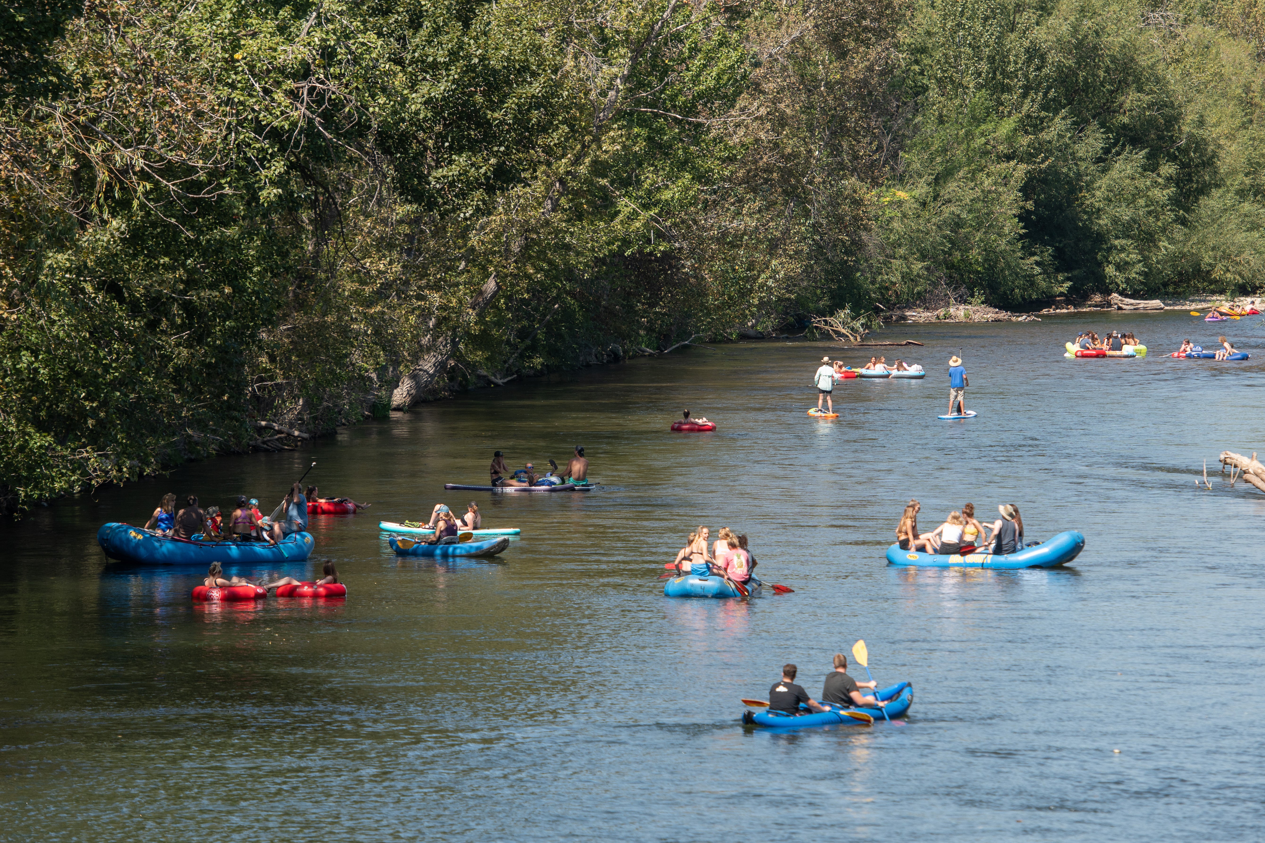 people floating on the Boise River in the summer