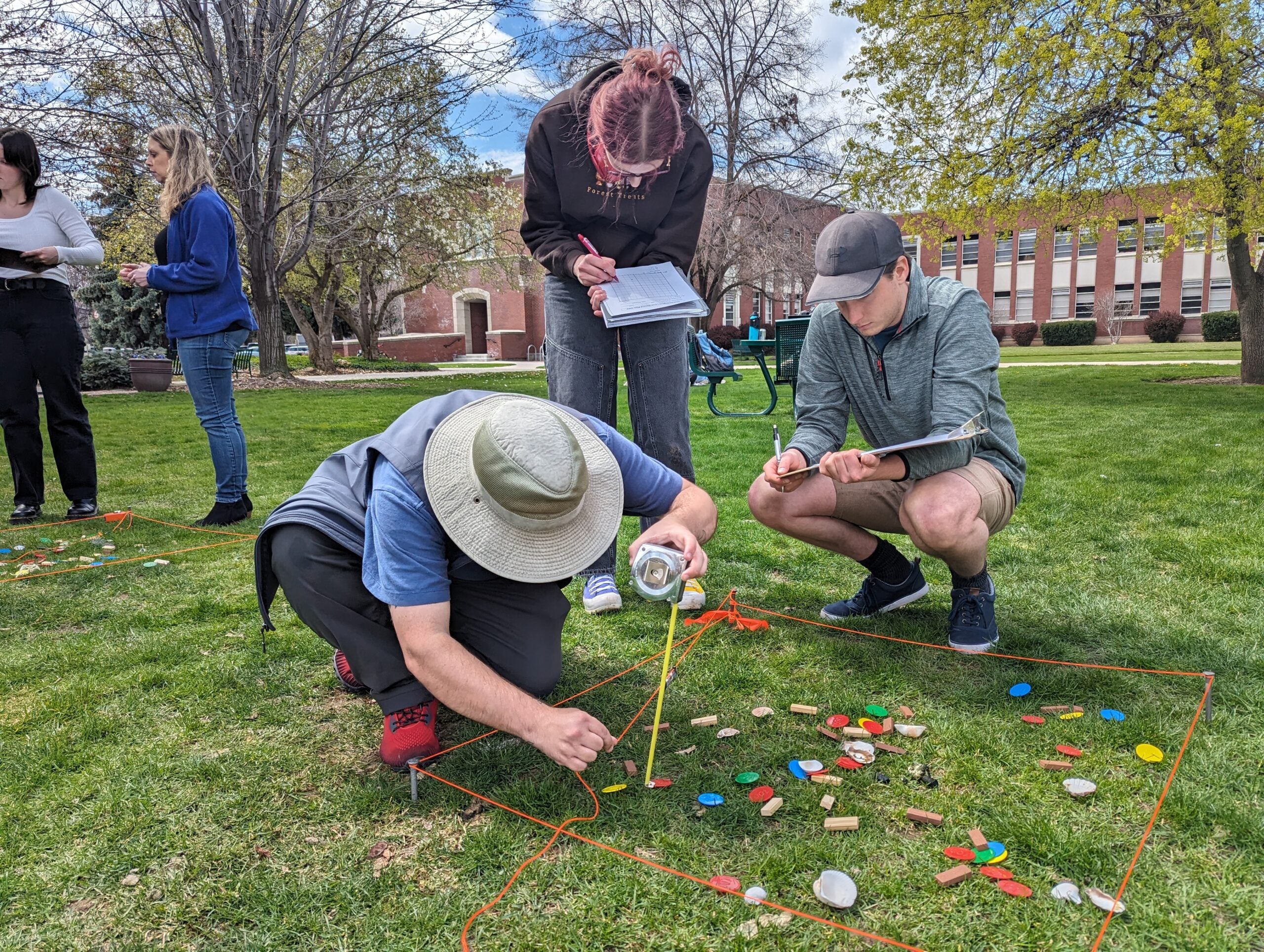 Undergraduate students partake in class outside