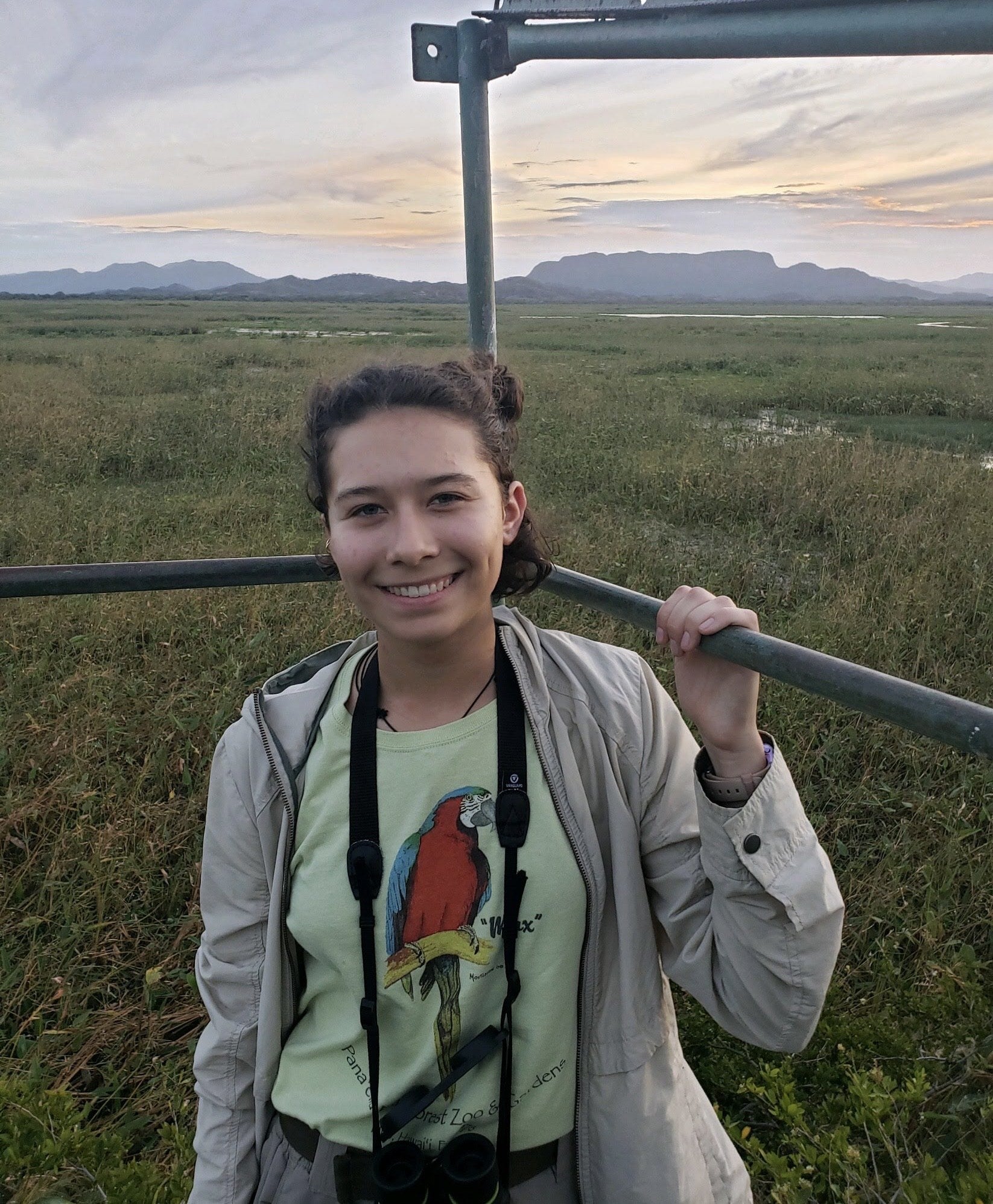 Picture of a field biologist holding a framing device