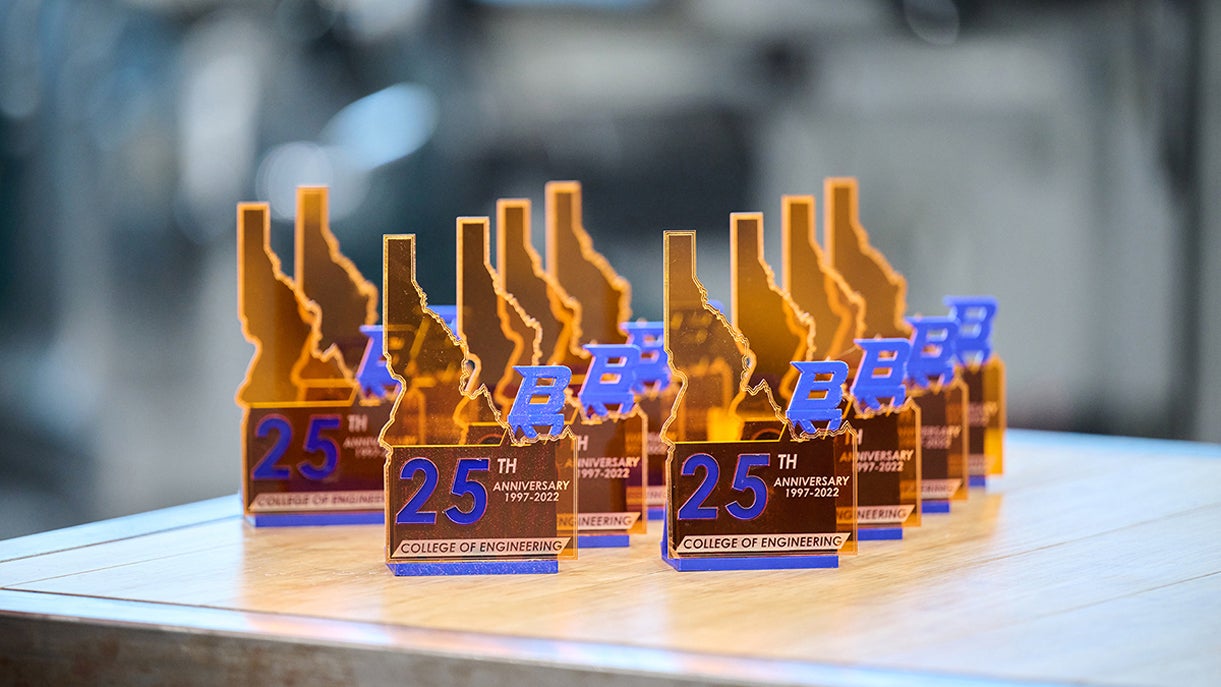 A display of 10 College of Engineering 25th Anniversary business card holders