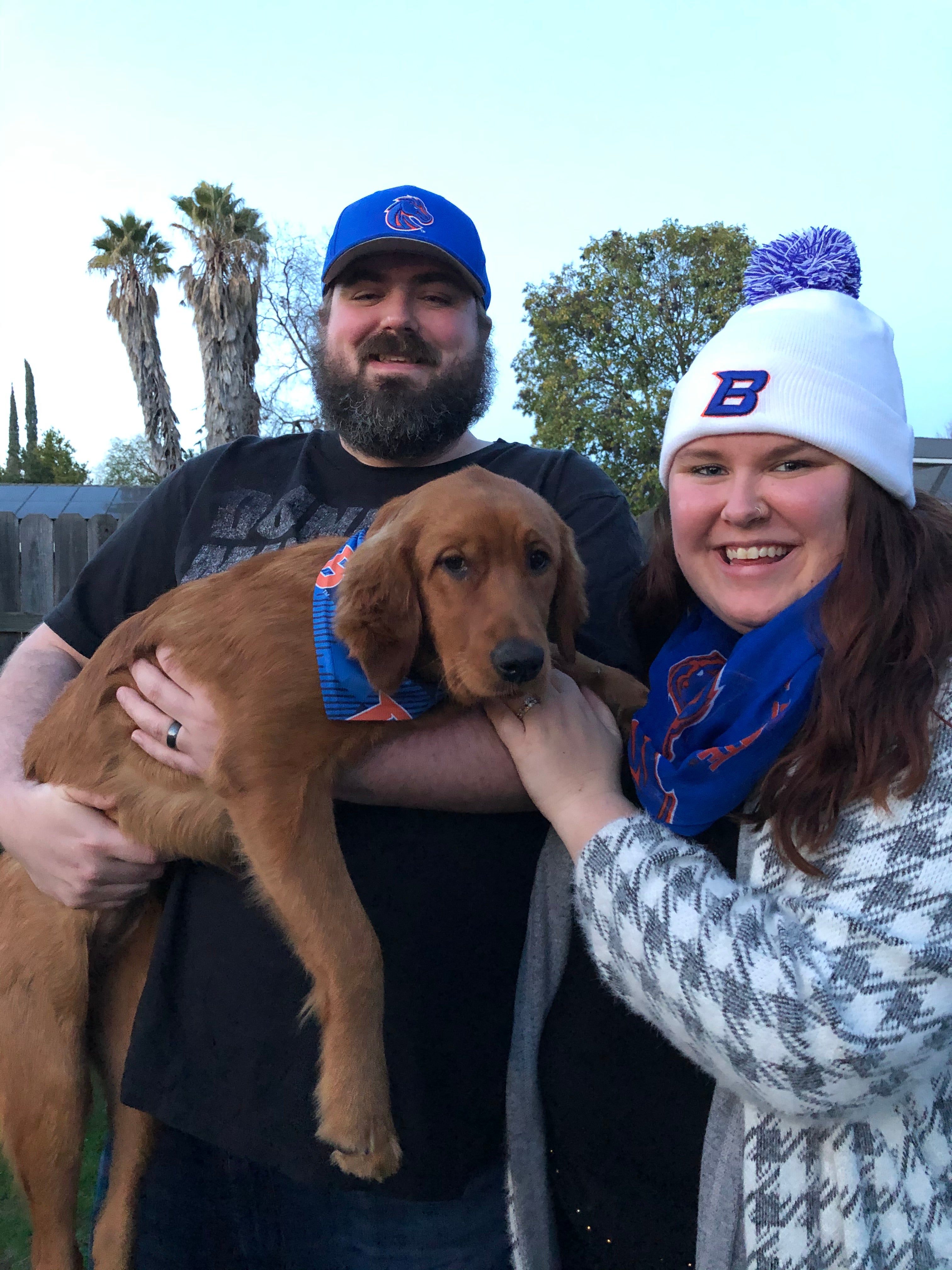 Photo of Jessica Barkley with her spouse and dog
