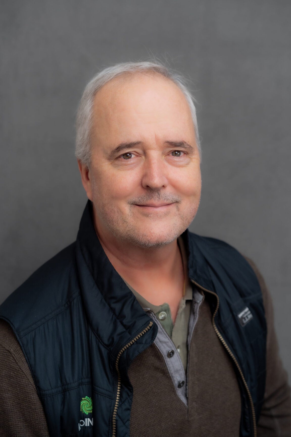 Portrait photo of Ken Cornell