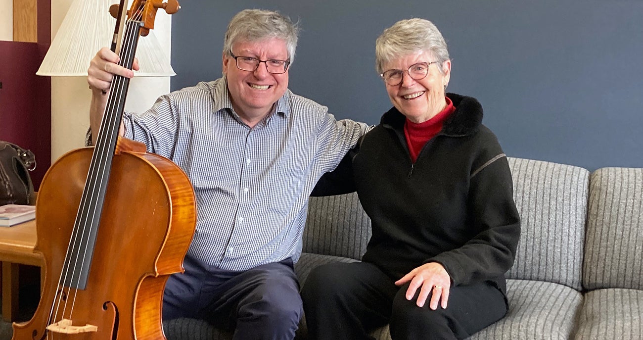 Craig Purdy, professor of violin and director of orchestras for the Boise State Department of Music along with Patricia Young who donated a cello to the Boise State Chamber Music Society for student use in the music department.