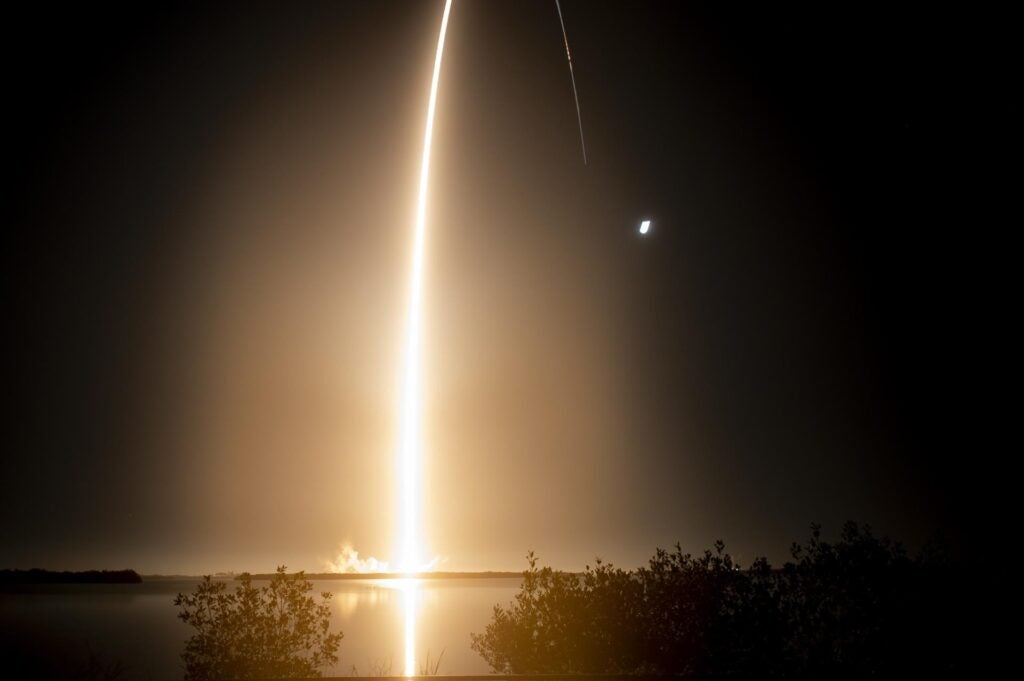 Long-exposure photograph of the Artemis I rocket launch.