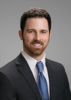 man in business suit headshot