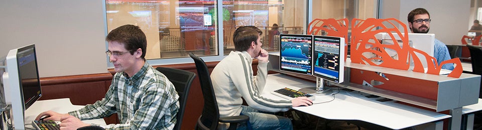 students in the Dykman Financial Trading room