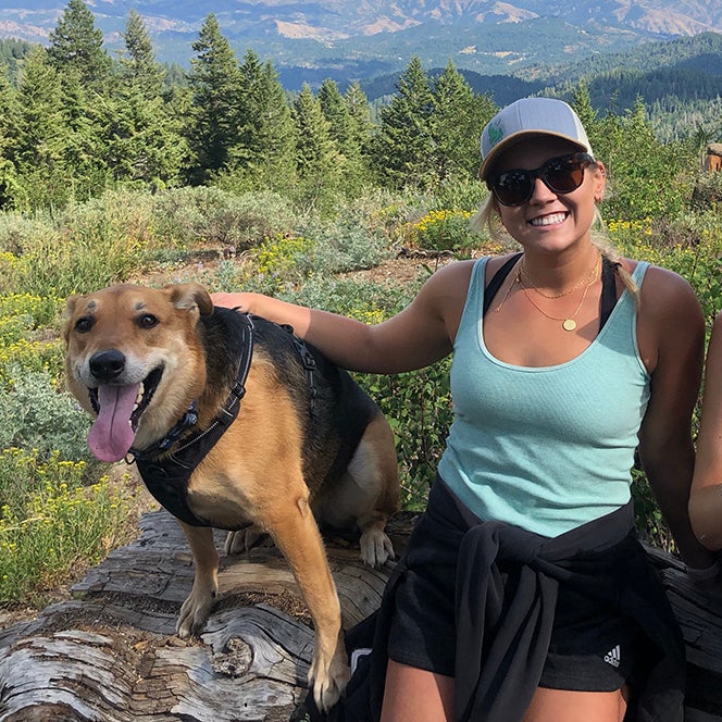 Tara with her dog on a hike at Bogus Basin