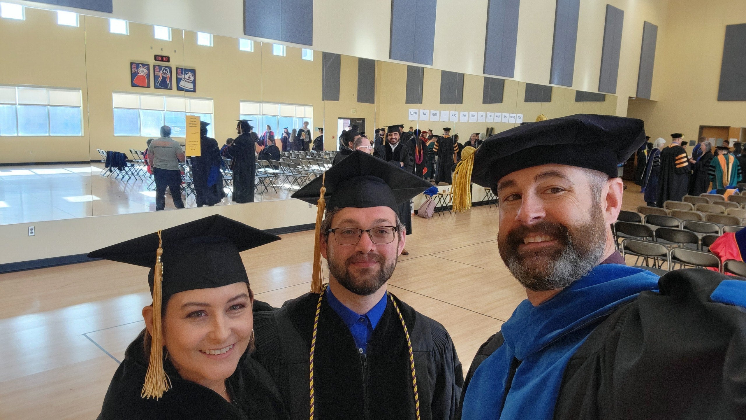 Boise State graduates in gym