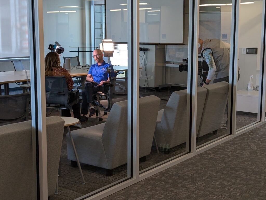 Photo of Casey Kennington interviewing with reporter Abby Wilt