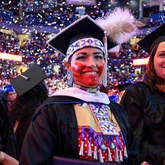 native American female graduate