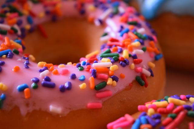 Donut with pink icing and sprinkles