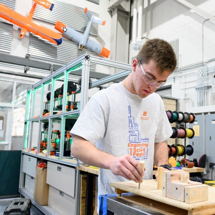 male student working in the Engineering Innovation Studio