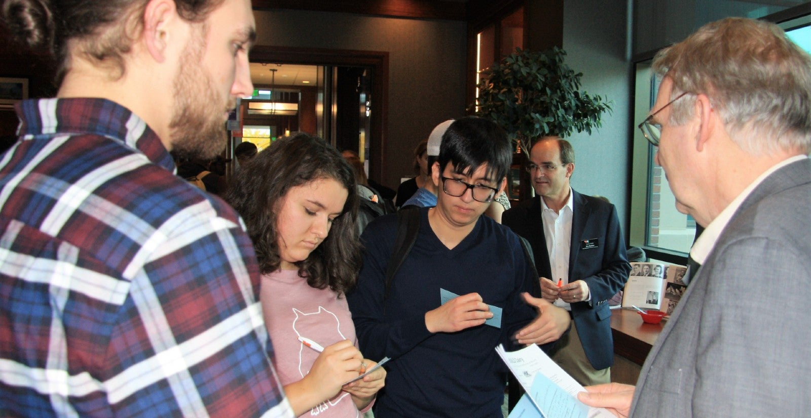students talk with industry professionals