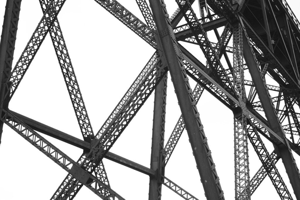 Stock photo of steel beams beneath a trestle