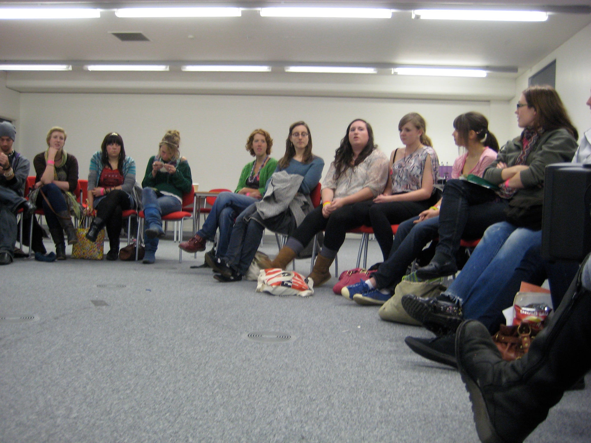 Students in a focus group, seated in a partial circle in the classroom.