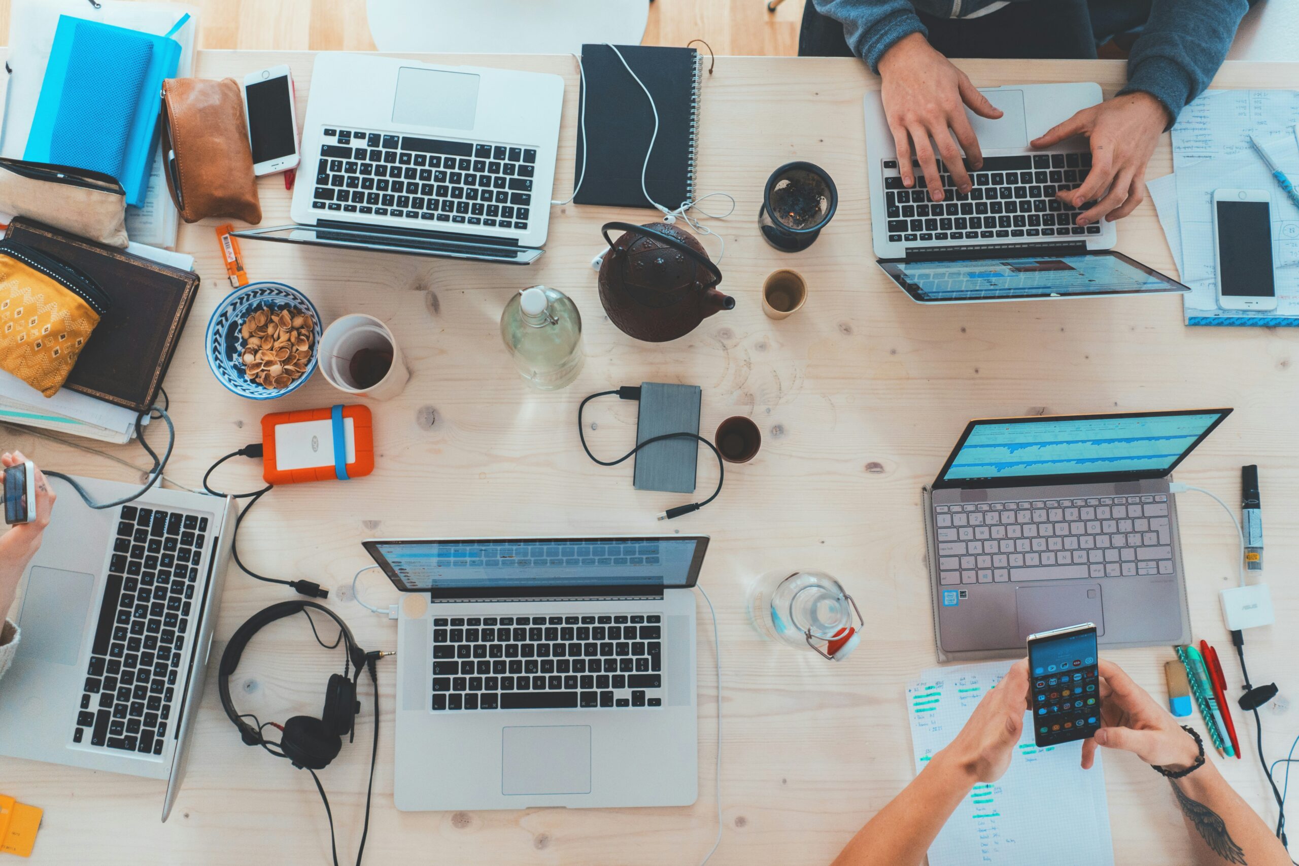 Overhead image of laptops open on a table