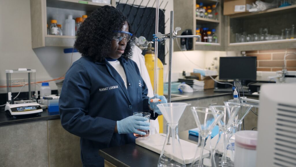 Photo of Rianat Lukman working in the lab