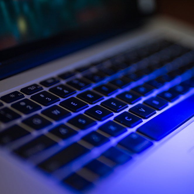 Photo zoomed in on the keyboard of a laptop