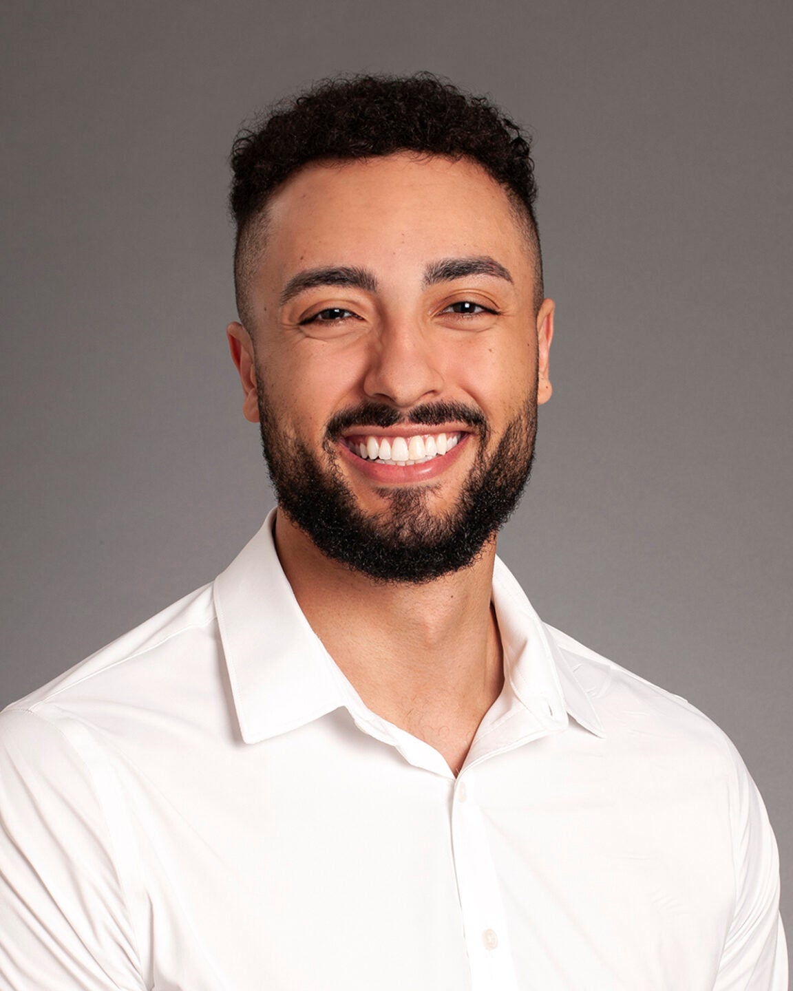 Professional headshot of McNair Scholar Sevio Stanton