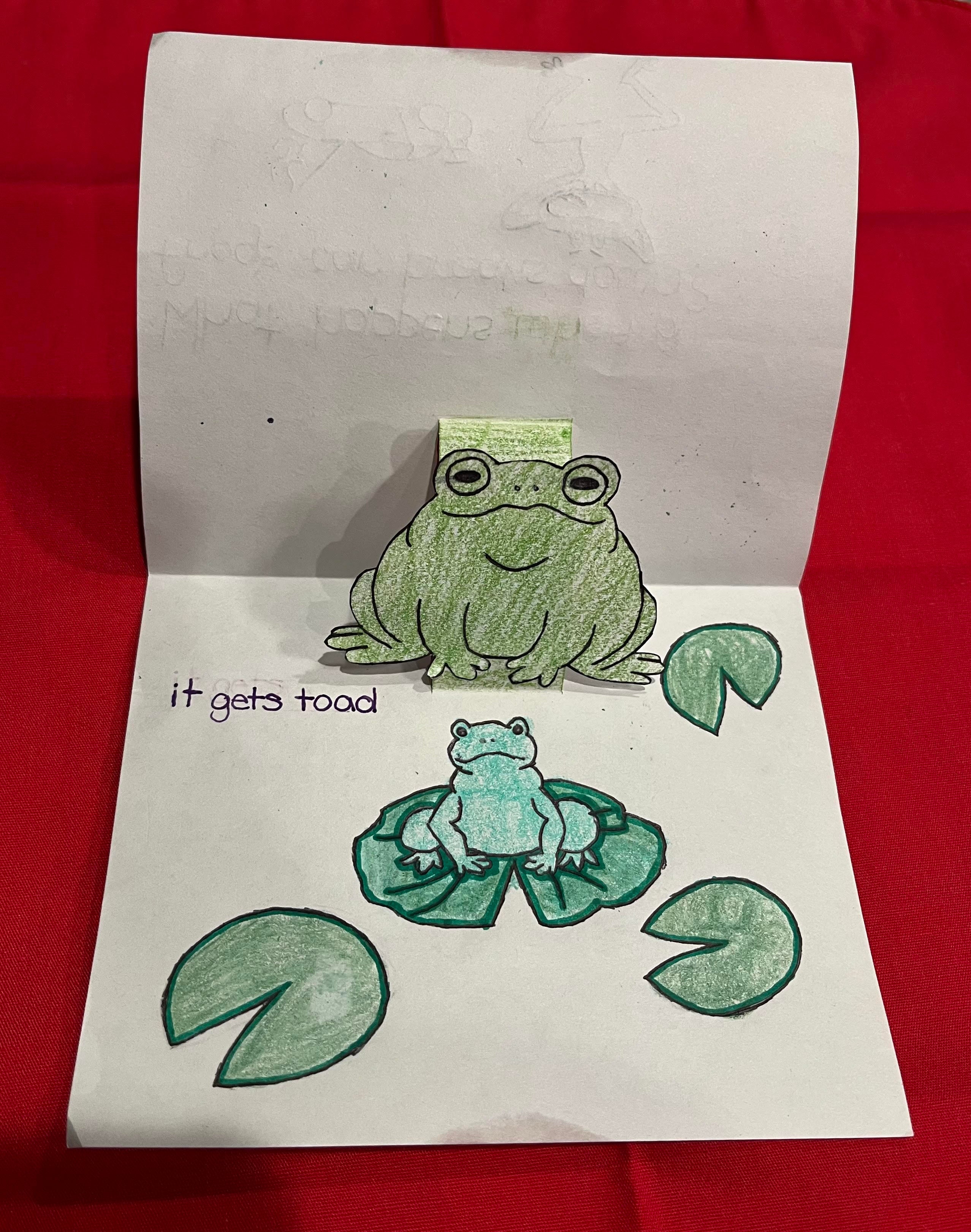 A thank you card that has two colored toads. One is on a lilipad and the other is a popup. Text reads, "it gets toad"