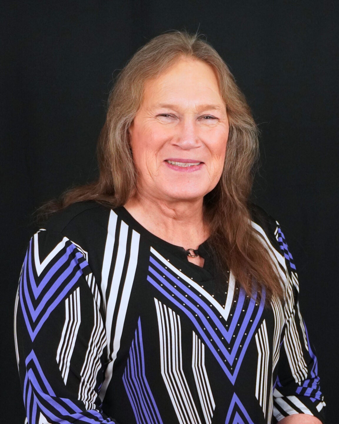 Professional headshot of Emma Wylde