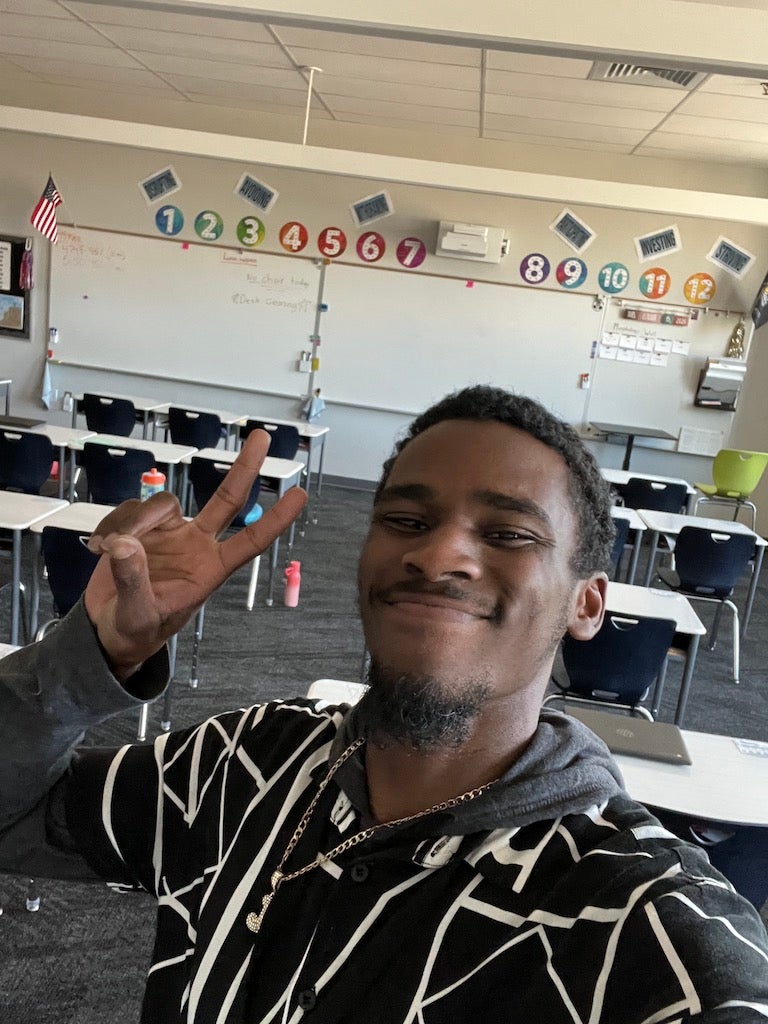 Photo of MJ Hoskins in a classroom