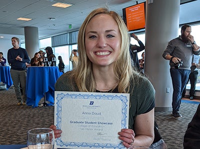 Anna Doud with award certificate