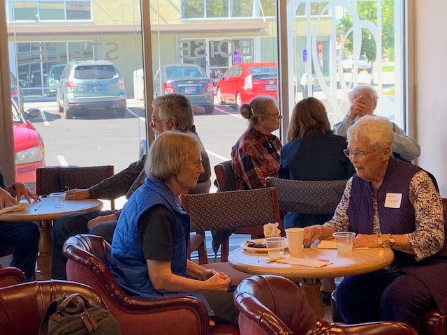 People gather to visit with friends and enjoy refreshments at the Emeriti Guild Fall Social 2019