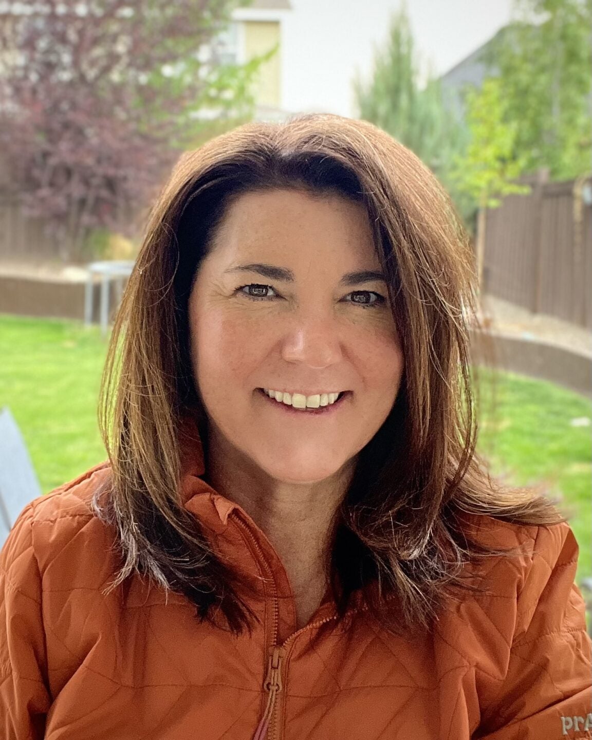 Picture of Heather Lile wearing her fall jacket.