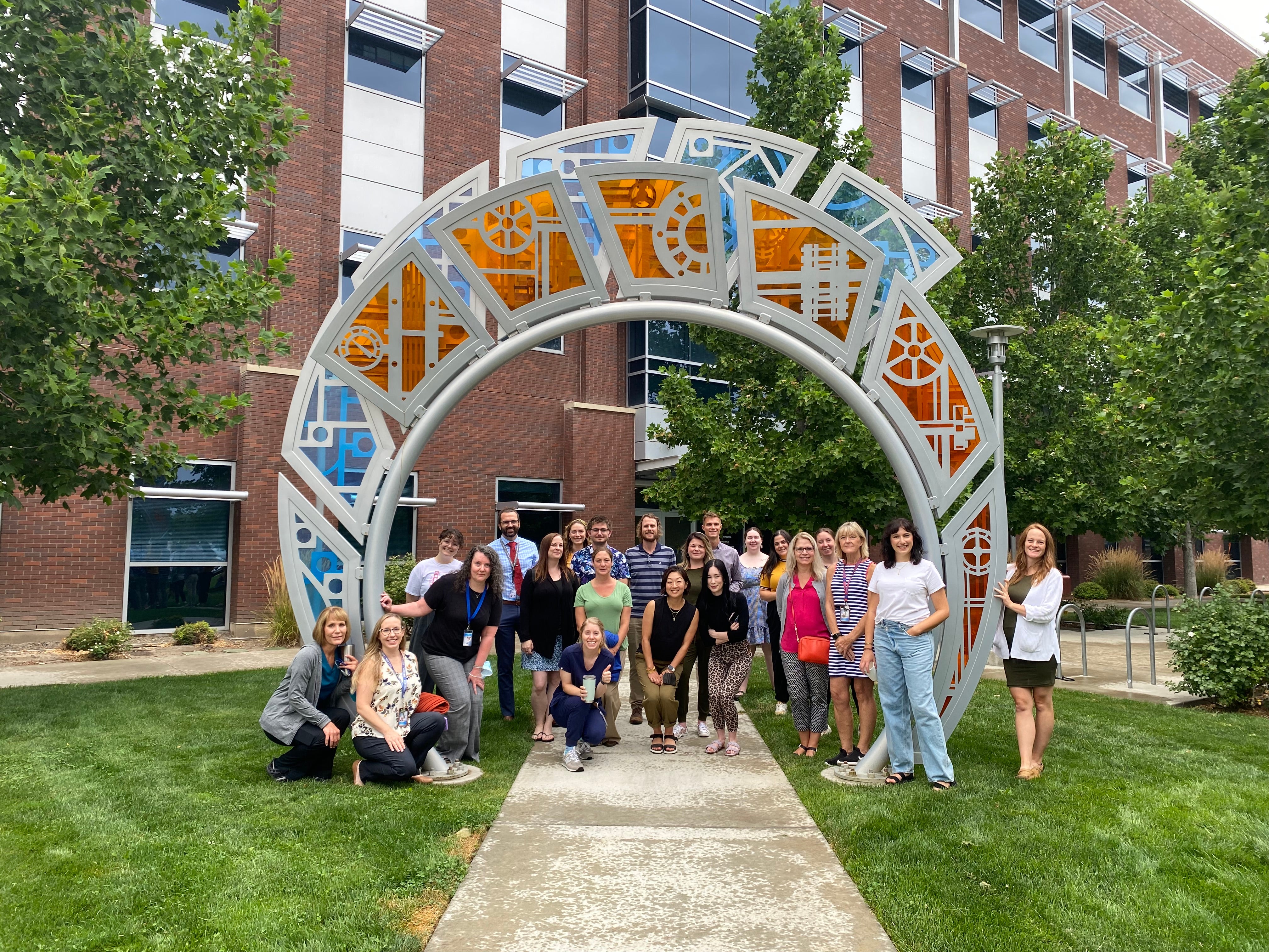 group Portrait by a monumental sculpture on Bois State campus