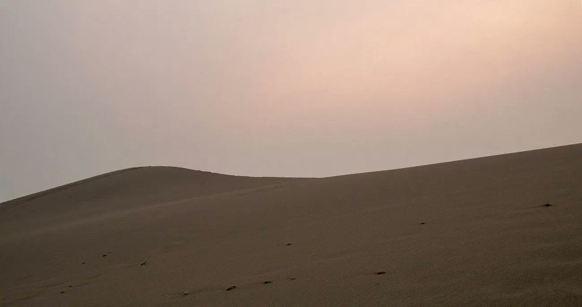 dusty sunset over Bruneau sand dunes