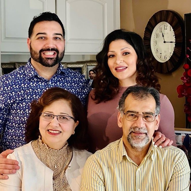 Amir Eslami BS, biology, 2010 – Amir Eslami (back, left) and Yalda Eslami with their parents, mother Afsoun Eslami and father Yadi Eslami.