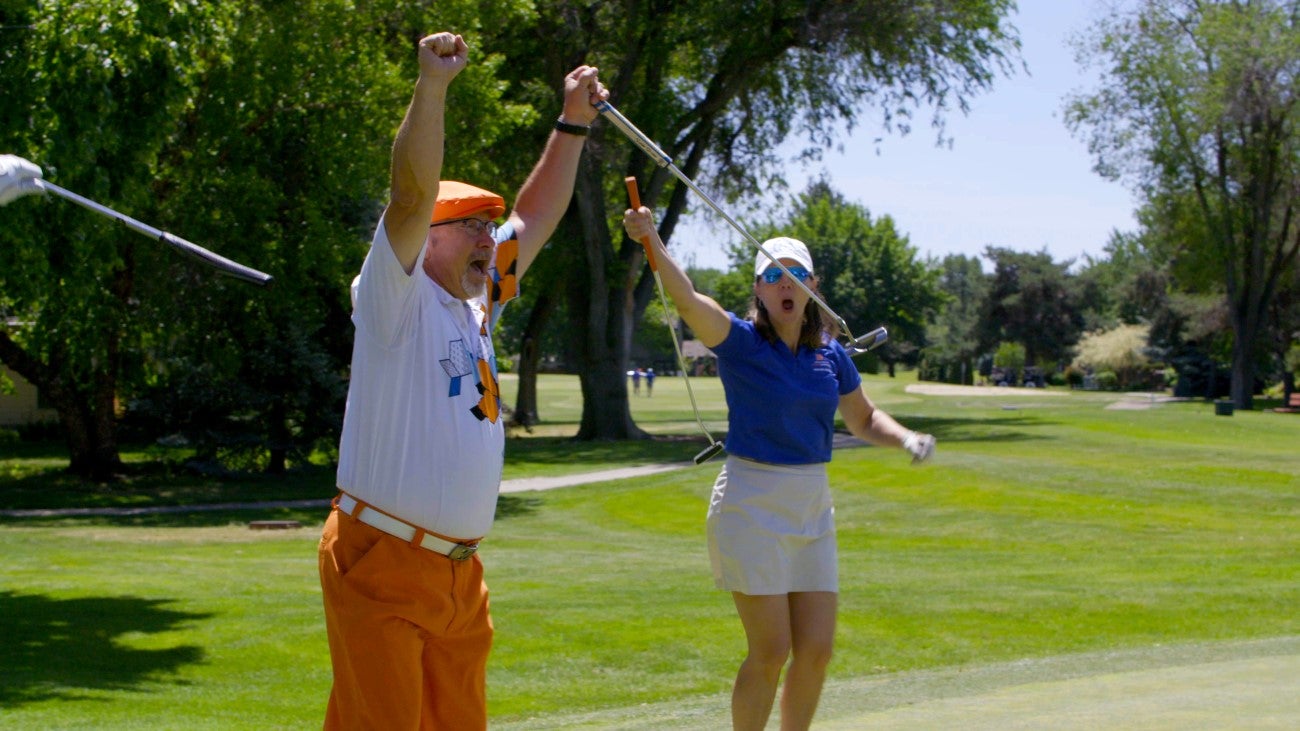 Jim Kerns and Tamara Thompson at the Drive for Impact Golf Tournament