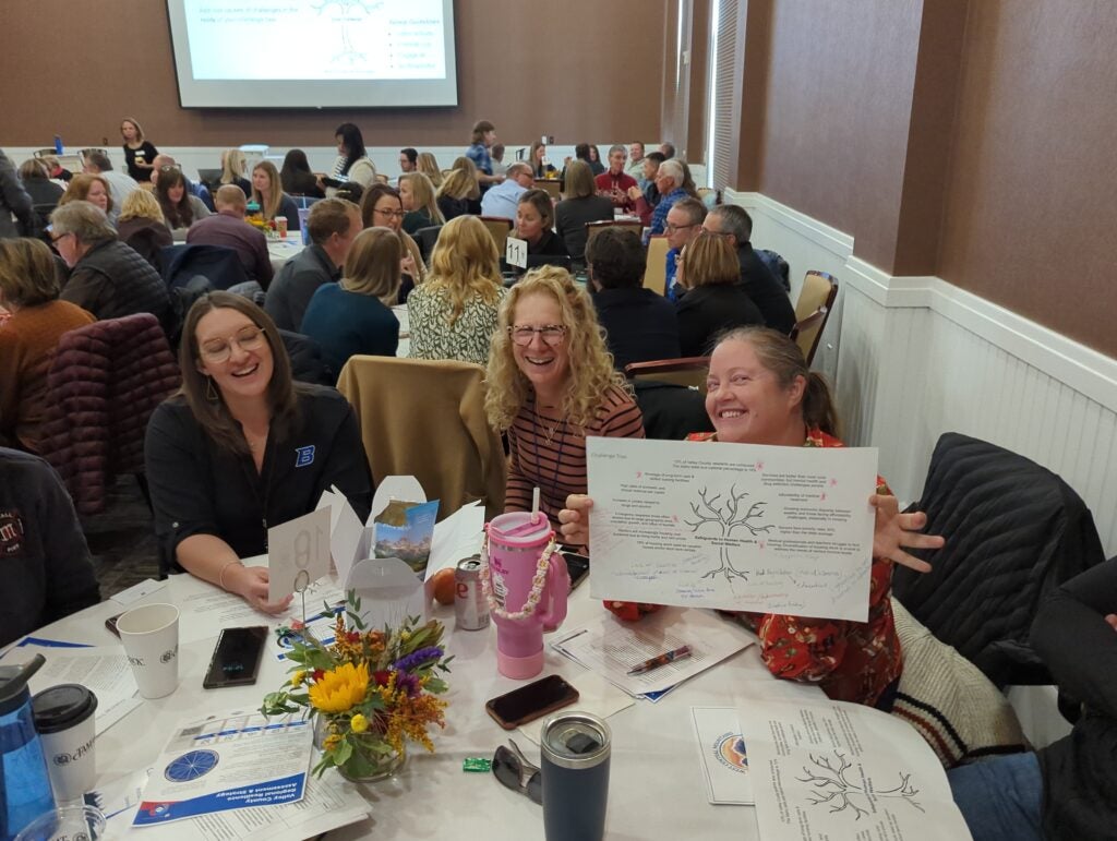 Three women at the West Central Mountains Economic Summit