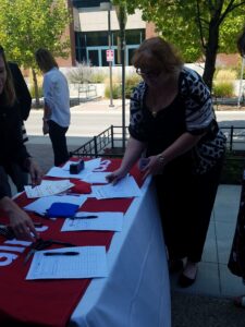 Michelle signing in