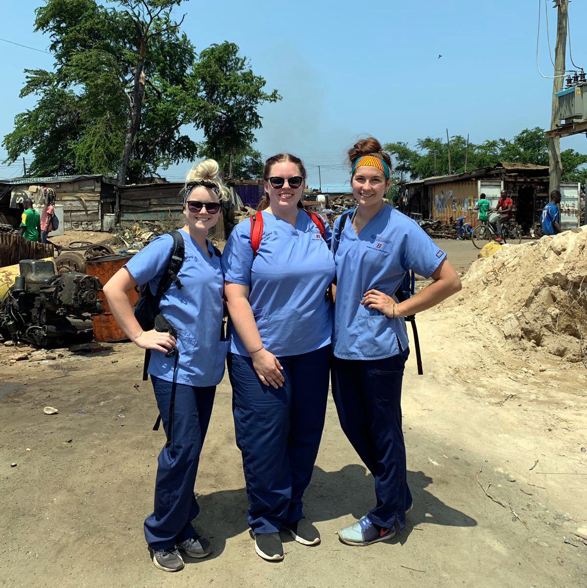 Abbey, Megan, and Davis posing for a picture in Ghana