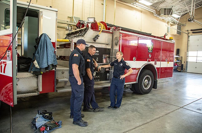 Captain Ashley Rosenbaum and staff at the Boise Fire Department Whitney Fire District Station No. 17. Photo by Arlie Sommer, Boise State Extended Studies.