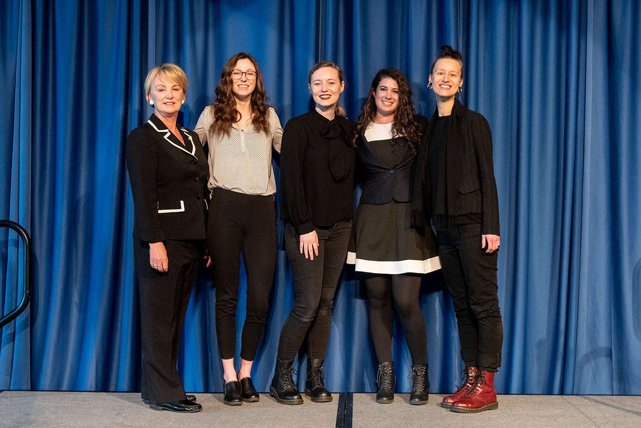 Three-minute thesis competition award winners posing for portrait