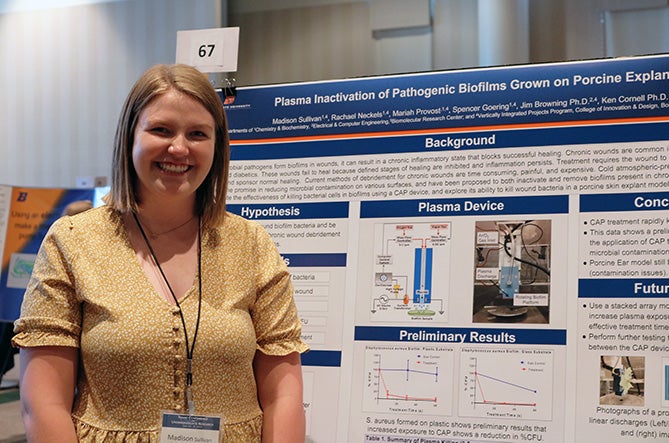 Madison with her research poster