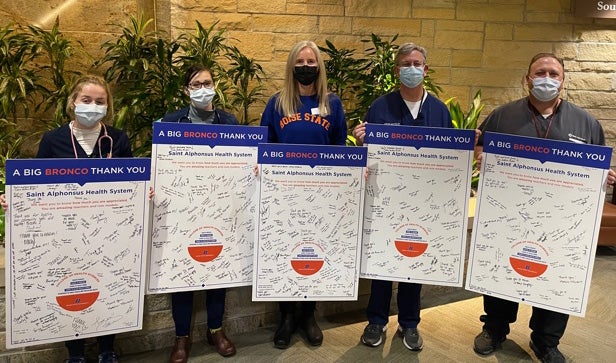 Boise State Respiratory Care students and alumni/faculty photo: Caitlin and Didi (current students) with Dr. Lutana Haan BS RRT '96 and MHS '09, Jeff Anderson MA '89, Owen Seatz BS RRT '93 and MA '93