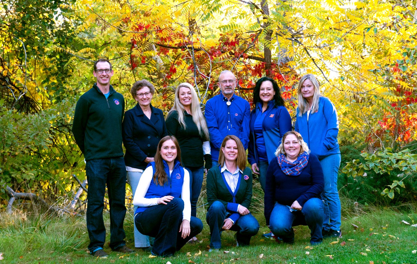 Radiologic Sciences faculty and staff group photo in fall by Boise River