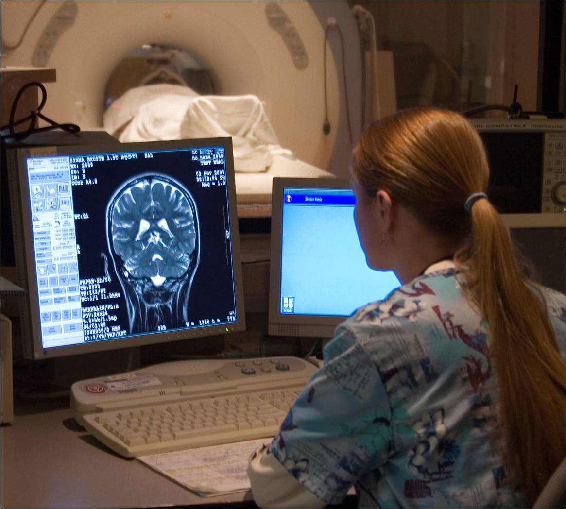Boise State alumni Julie Brown, 2005 graduate performs an MRI scan of a patient.
