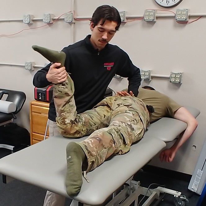 Owen Mainord offers therapy to army soldier