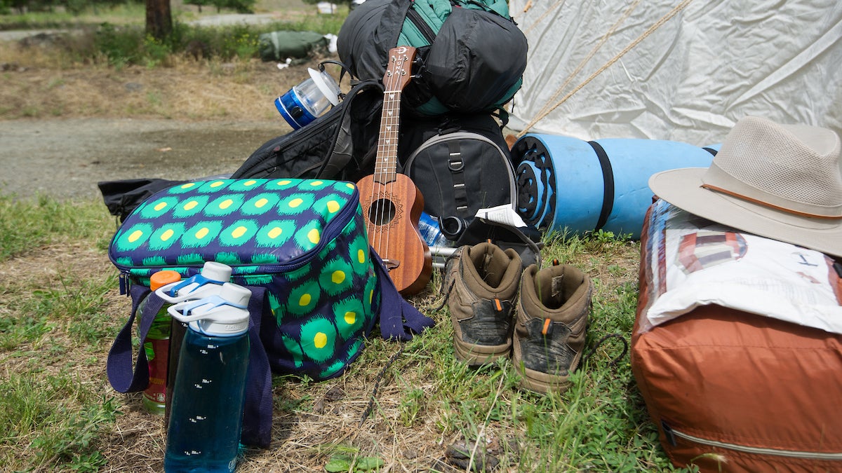 Photo travel goods. Backpack, boots, hat, water bottle, etc.