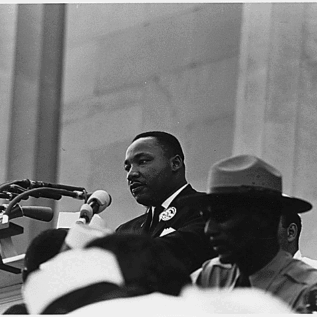 Dr. Martin Luther King, Jr. speaking at a Civil Rights March.