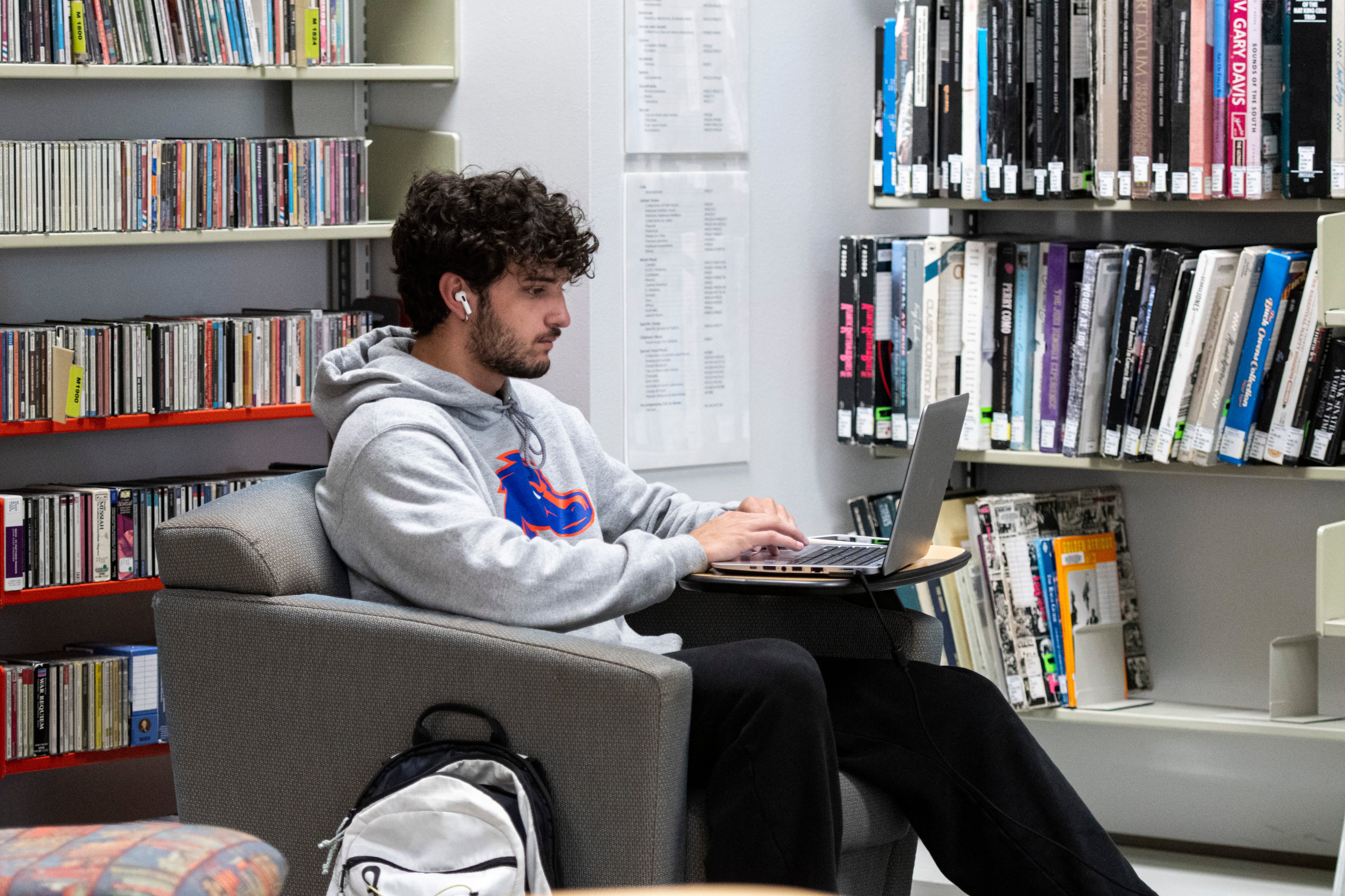 student using laptop in computer