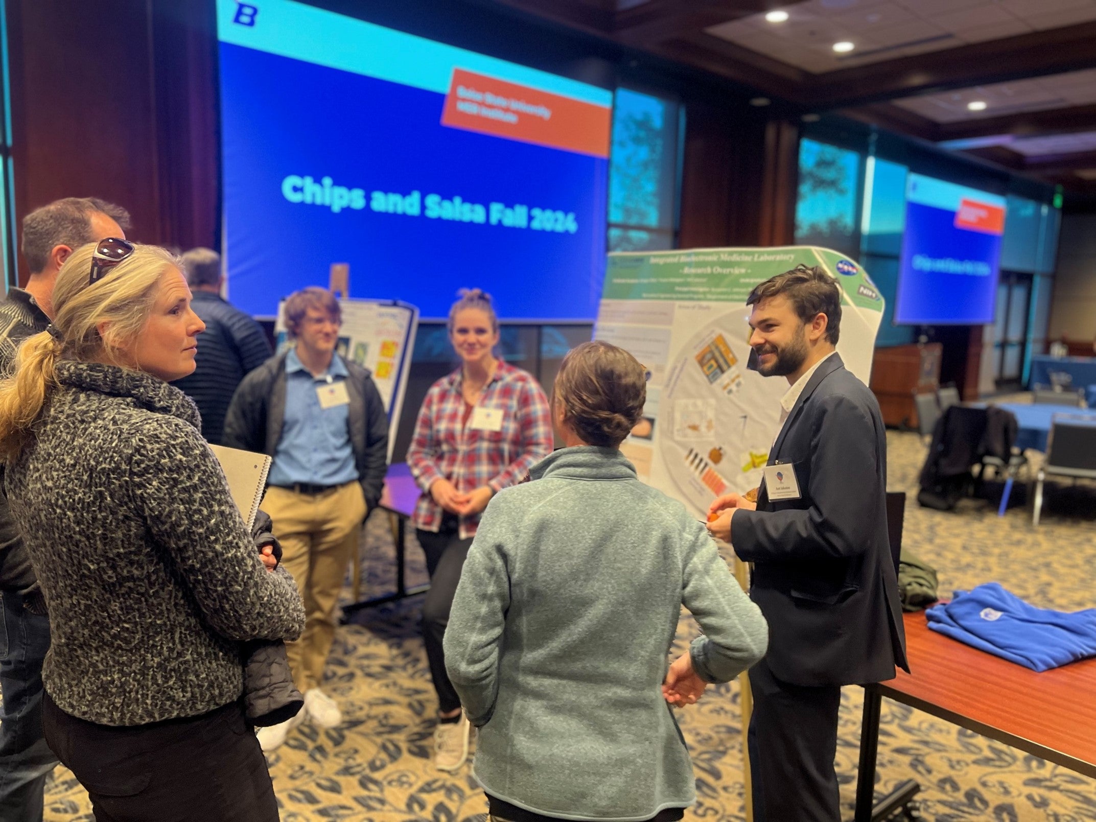 Students network with attendees. 
