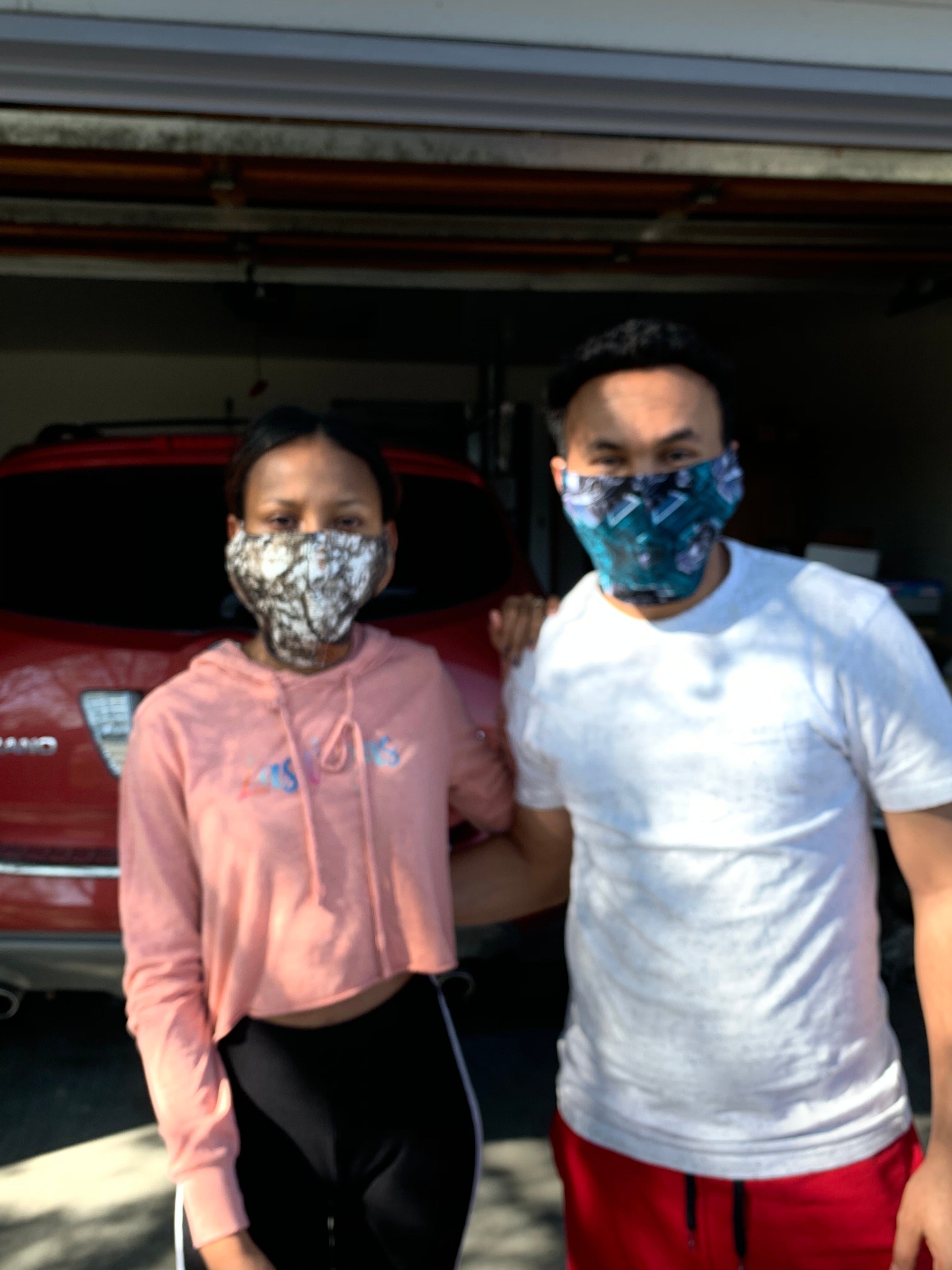 two people wearing face masks