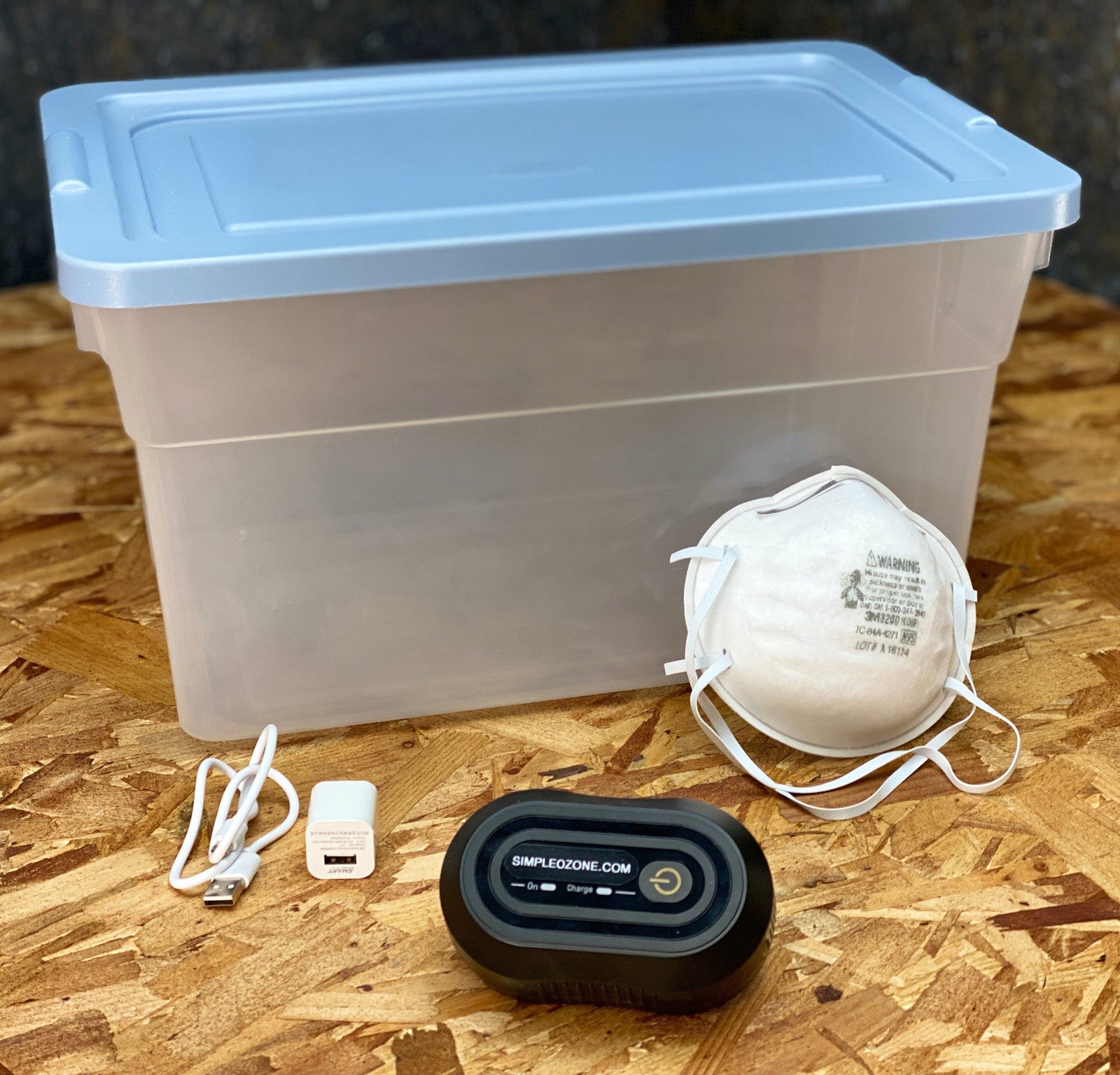 Plastic container, N-95 mask, USB cord and wall outlet, ozone device